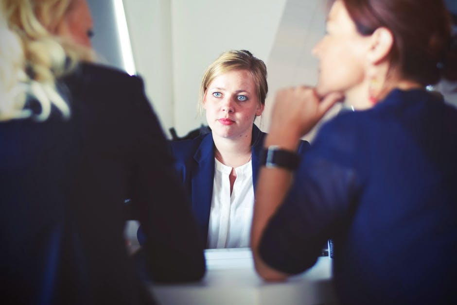 Person Having Conversation With Potential Lawyers